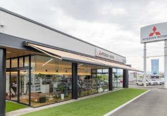 沼津・三島・富士・裾野・御殿場エリアで三菱車を販売・整備する沼津三菱自動車販売 沼津バイパス店の外観